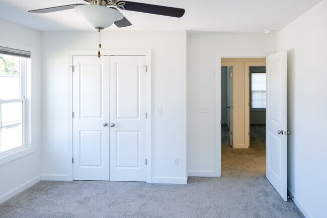 Building Photo - Like-new 3 bedroom, 2.5 bath house with an organic pond!