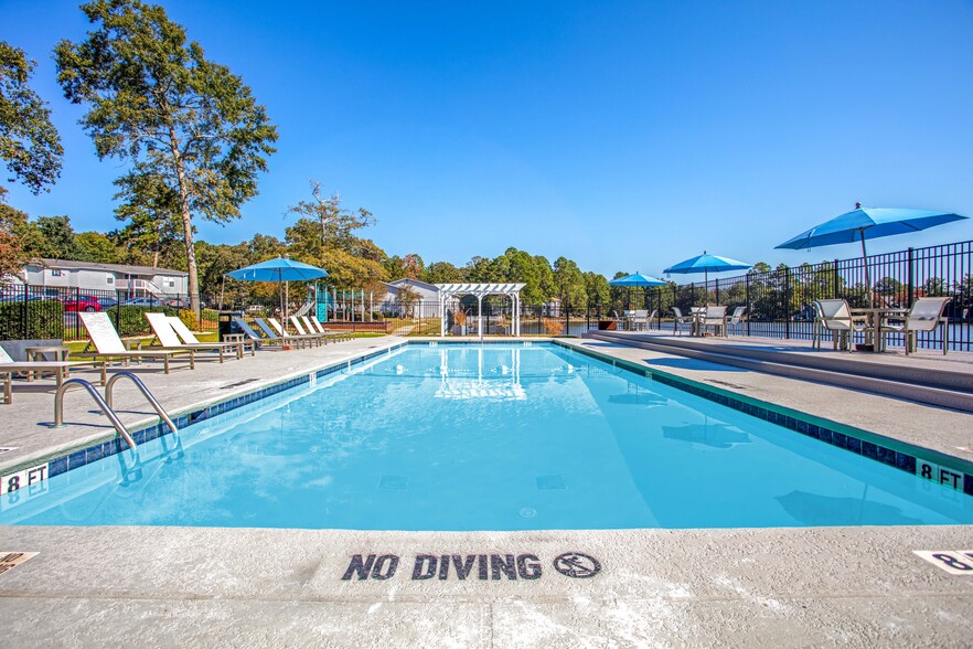 Building Photo - Castaways at Hidden Harbor Apartment Homes