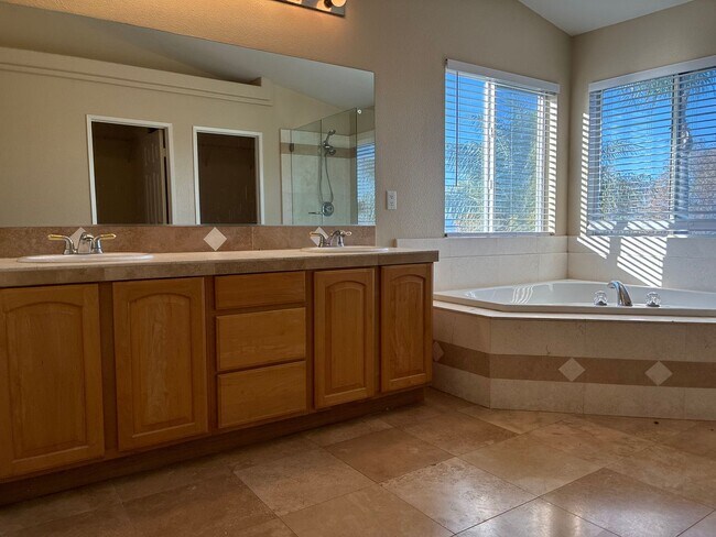 Building Photo - Stunning 4-bedroom hilltop residence nestled in the desirable upper Corona