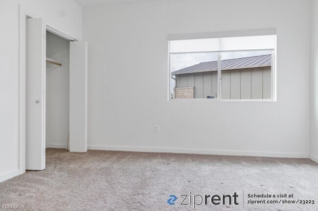 Building Photo - 2 br, 2.5 bath Townhome - 7805 Cooper Lane...