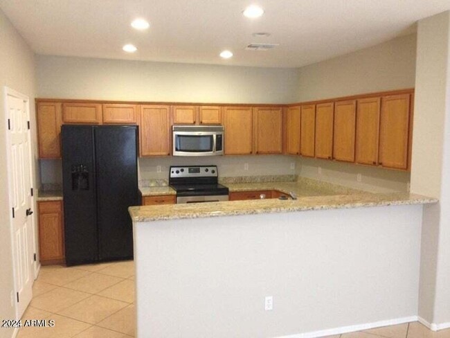 Building Photo - 5820 E Harmony Ave