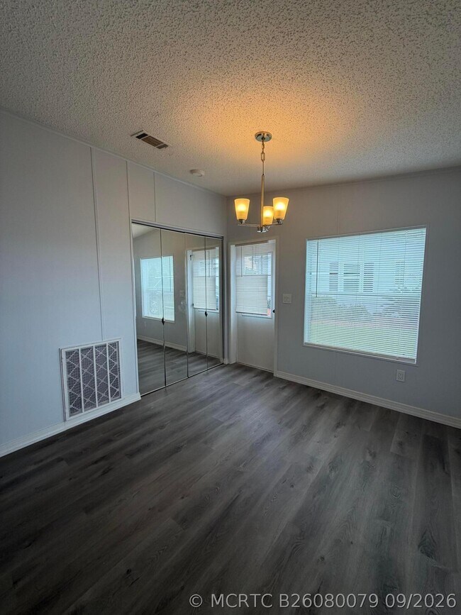 Building Photo - 8179 Sandwedge Terrace