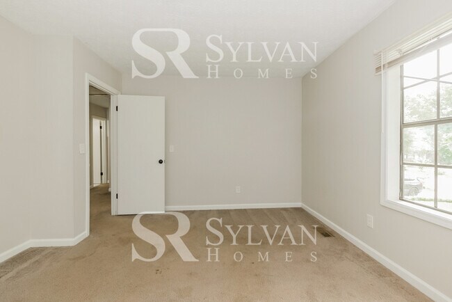Building Photo - Immerse yourself in comfort and convenience