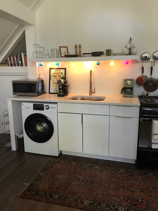 washer/dryer combo inside apartment - 476 Waldo St SE