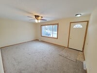 Building Photo - 4 BD, 2 BA - FENCED IN YARD, PRIVATE TRAILS, FINISHED UPPER AND LOWER LIVING AREAS, ATTACHED GARAGE!