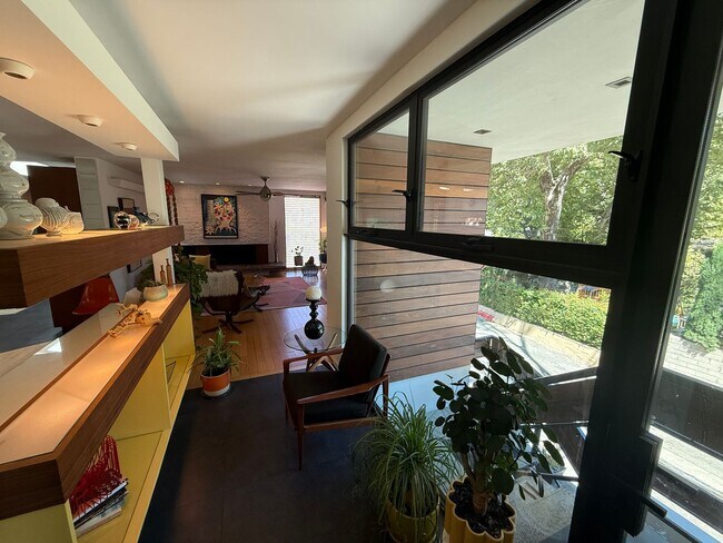 Building Photo - Mid-Century Modern 3-Bedroom Home with Pri...