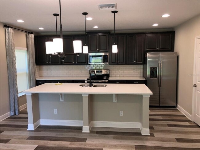 Building Photo - 5512 Windsong Oak Dr