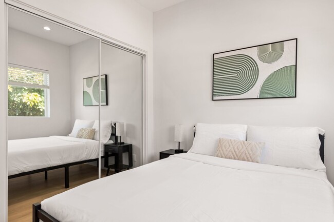 Building Photo - A 3 Bedroom apartment with ensuite bathrooms, common areas and a fully functional kitchen at 1736...