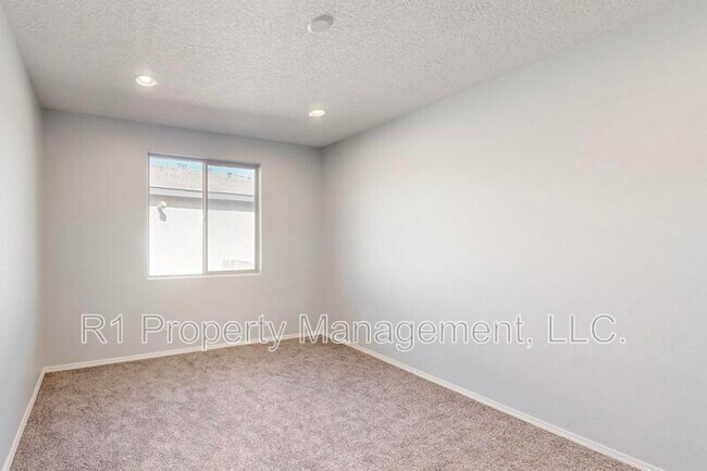 Building Photo - 6405 Kings Cyn Cv NE