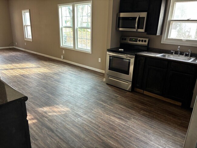 Building Photo - Ask About our Move in Special! Charming 3 Bed 1.5 Bath Home With Fenced Yard