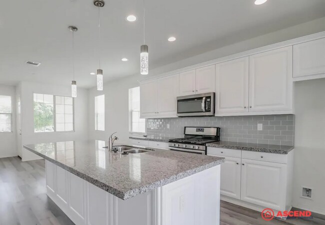 Building Photo - Stunning 4BR/3.5BA Home – 2,300 SqFt | Gated Community w/ Pool, Gym & Clubhouse | Gardener Included!