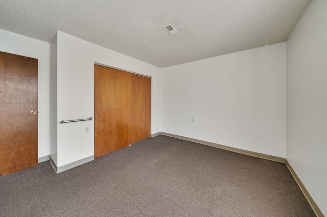 Building Photo - Come live in a 55+ community in an old sch...