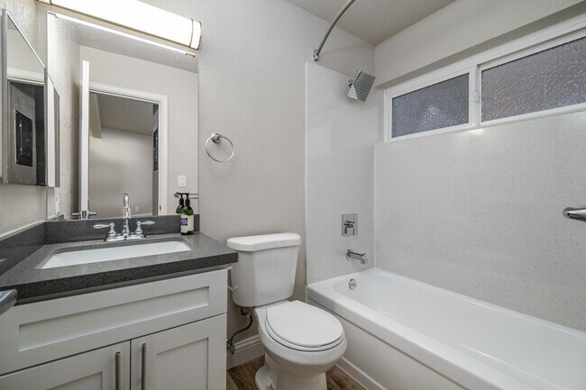 Building Photo - Fully remodeled studio apartment in gated ...