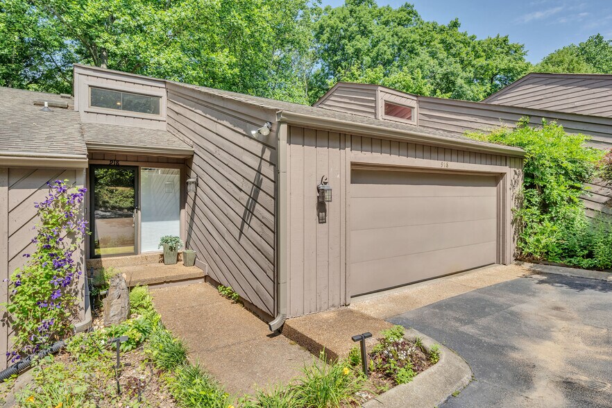 2 car attached over sized garage with attic storage. - 918 Harpeth Trace Dr
