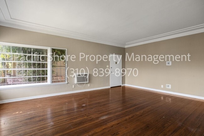 Building Photo - 8674-8674 W Olympic Blvd