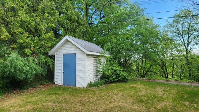 Building Photo - Spacious 4-Bedroom Home with Bonus Room, 3-Season Porch & Private Backyard