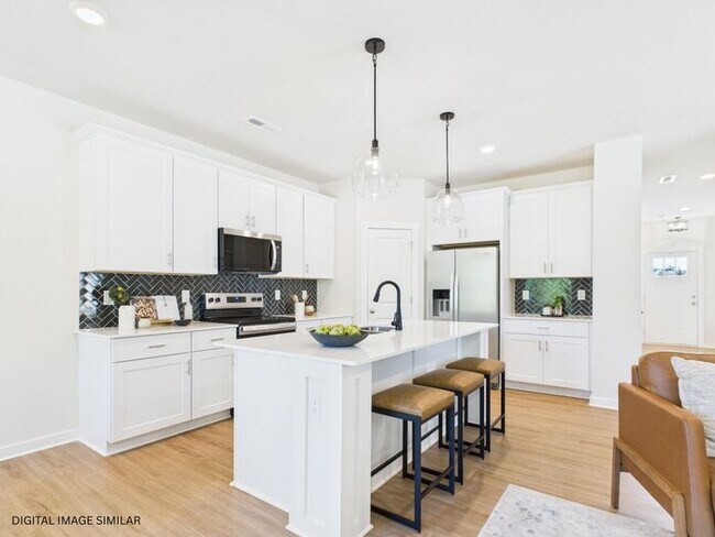 Building Photo - Brand New Beautiful Townhome! Small Pets Welcome! Attached Garage!