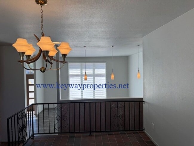 Building Photo - Welcome to Your New Home in NE Heights – Spacious, Stylish, and Full of Charm!
