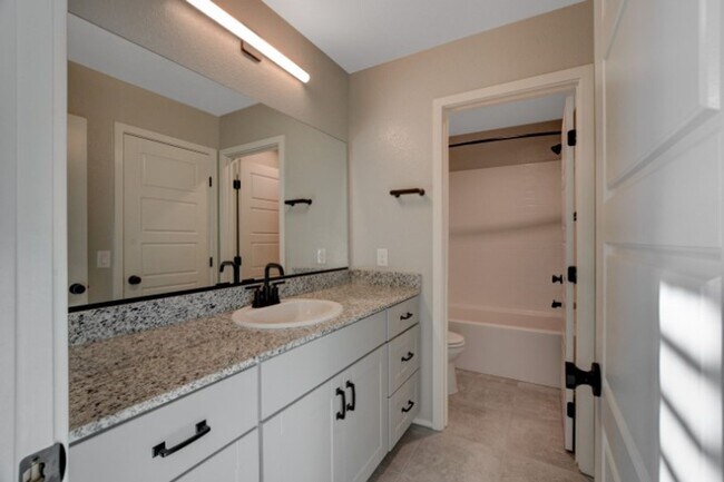 Building Photo - Don't miss this Top Notch 4 Bedroom, Beaut...