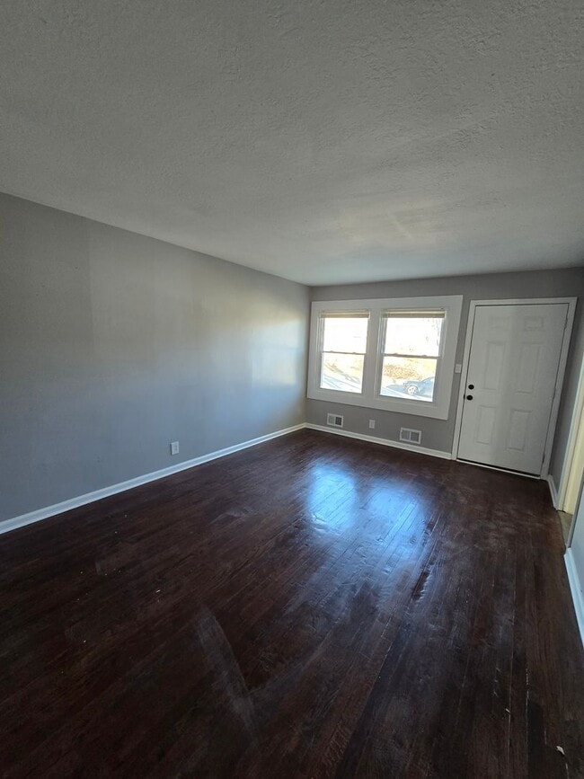 Building Photo - 3 bedroom with bonus extra room in basement fully rehabed