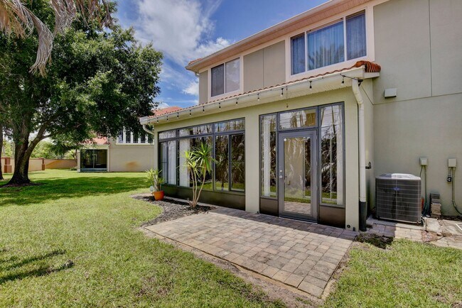 Building Photo - Stylish and Spacious 3/2.5 Townhome with Premium Features and Community Pools