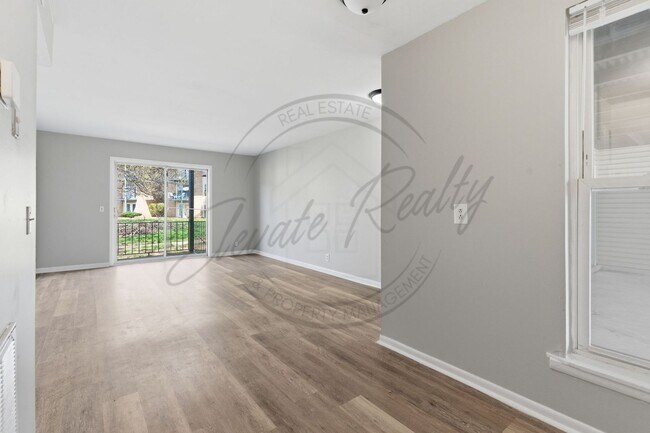 Building Photo - SPRING SPECIAL!! FIRST MONTH FREE on this ONE Bedroom Condo, First Floor, across from Madison Park!