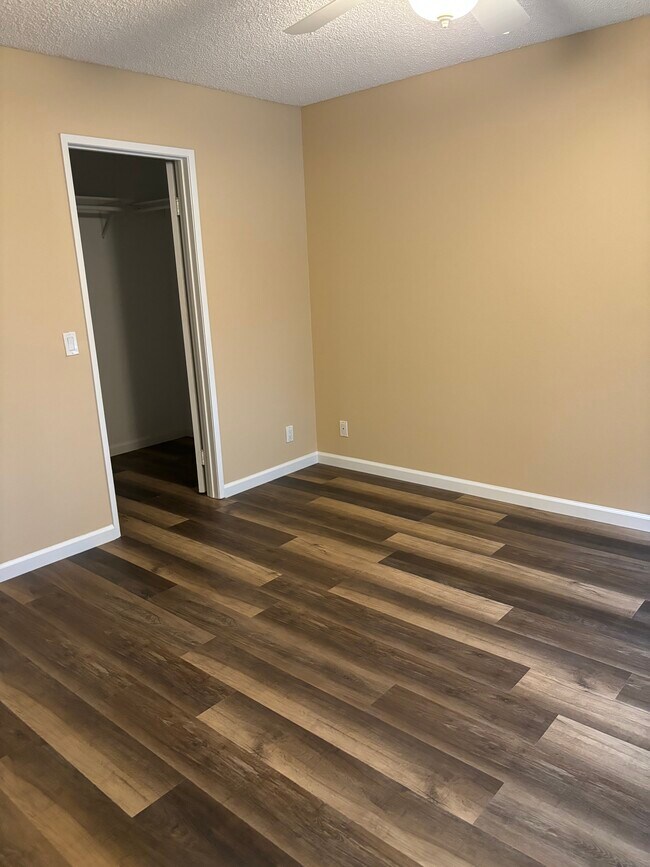 Bedroom with walk in closet - 1059 Shadowridge Dr