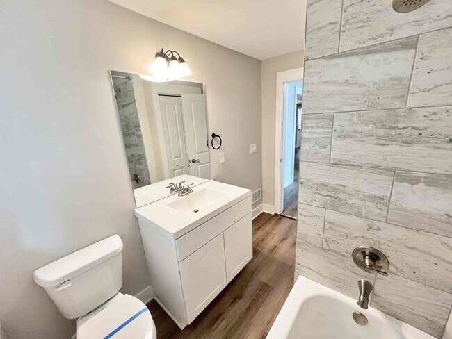 Building Photo - Completely Renovated 3 BR/3 BA Ranch with ...