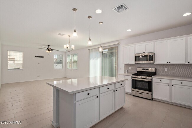 Building Photo - 3813 N 100th Dr