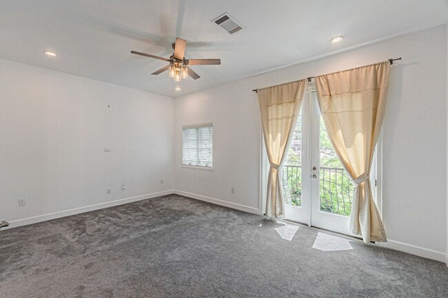 Building Photo - Coming Soon! | 2 Bedroom + Office Townhouse | Private Rooftop Deck | Prime Uptown Location