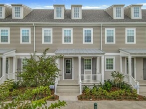 Building Photo - New Luxury Townhome in Celebration with All porcelain tiled floors. Island Village new construction