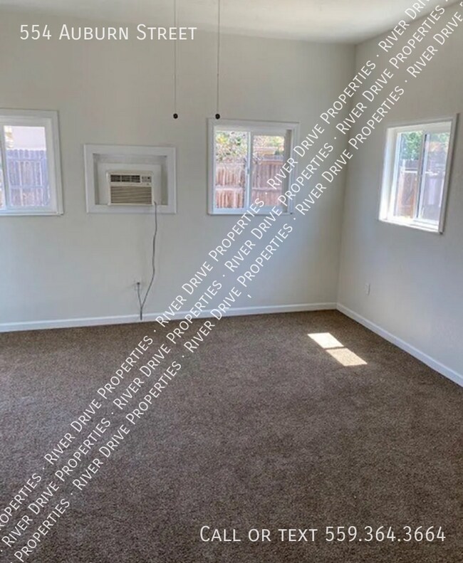 Building Photo - PRICE DROP- Spacious Vintage Beauty in Tulare