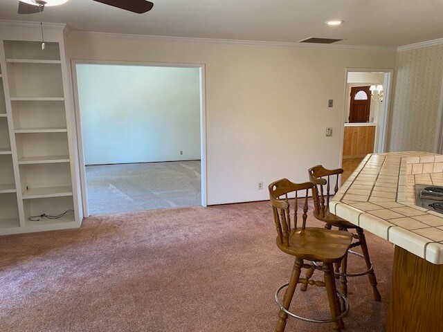 View of the kitchen, family and living rooms - 819 Midvale Ln