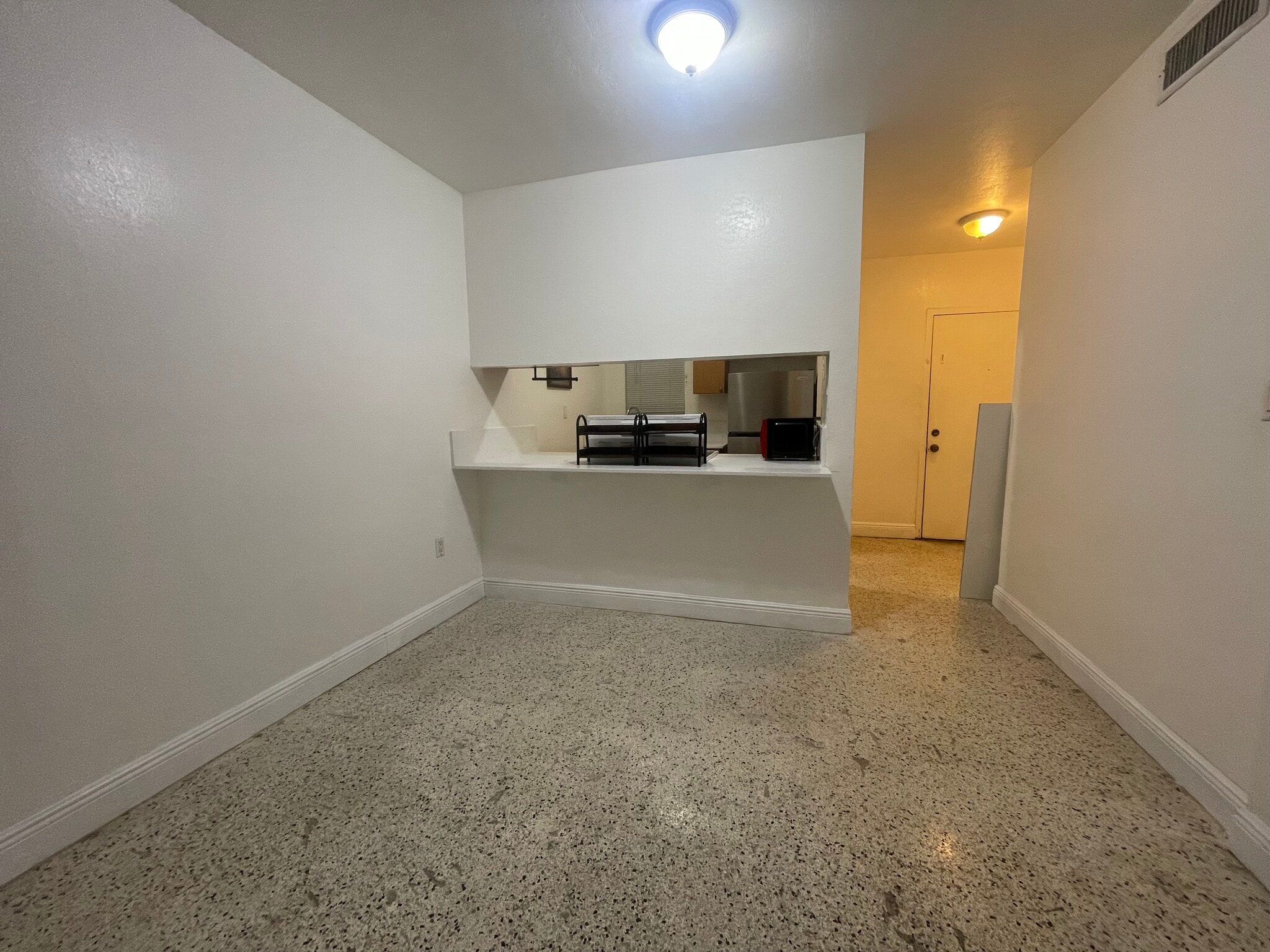 Kitchen view from living room - 665 NE 83rd Ter