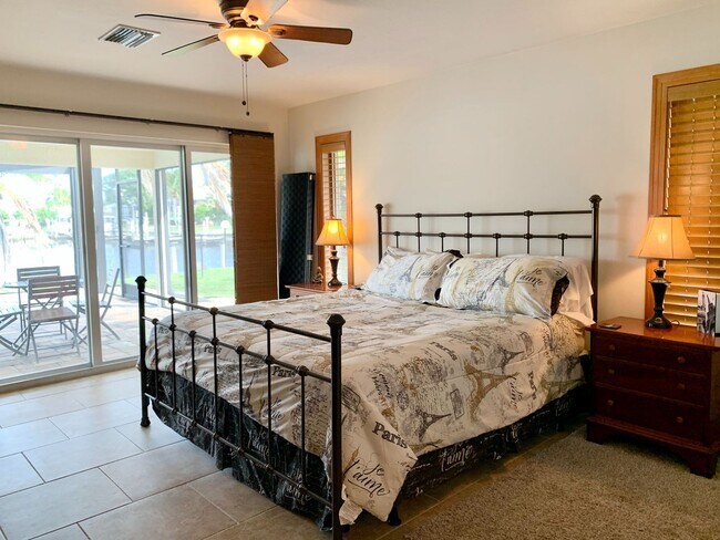 Building Photo - AVAILABLE 2027 SEASON! ! PGI HEATED POOL, WATERFRONT, BOAT LIFT