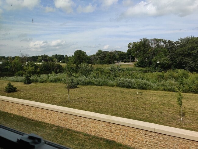 Building Photo - Conveniently located Riverbend Apartments feature a quiet community with a large green space