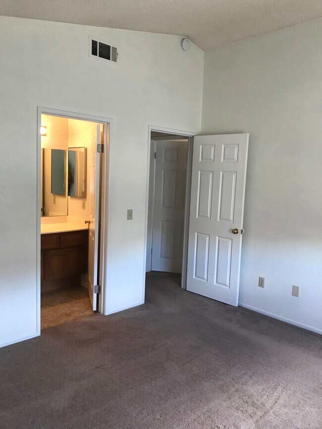 Master bed/bath window in backyard - 2121 Phlox Ave