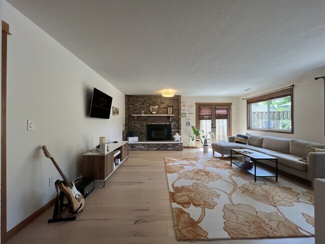 Building Photo - Bright and Open 4 Bedroom Cedar Mill Home with Vaulted Ceilings, Skylights & Multiple Living Areas