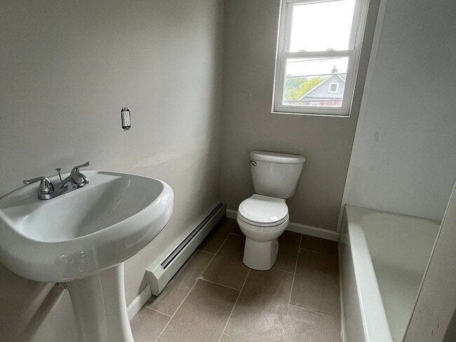 Building Photo - Move in to this singe family fully renovated home featuring 3 bedrooms 2 full baths located direc...