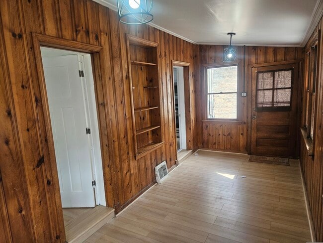 Building Photo - 6125 W Newport Ave