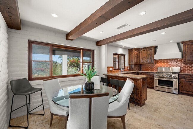 Building Photo - This Beautiful Hacienda Style Home combine...