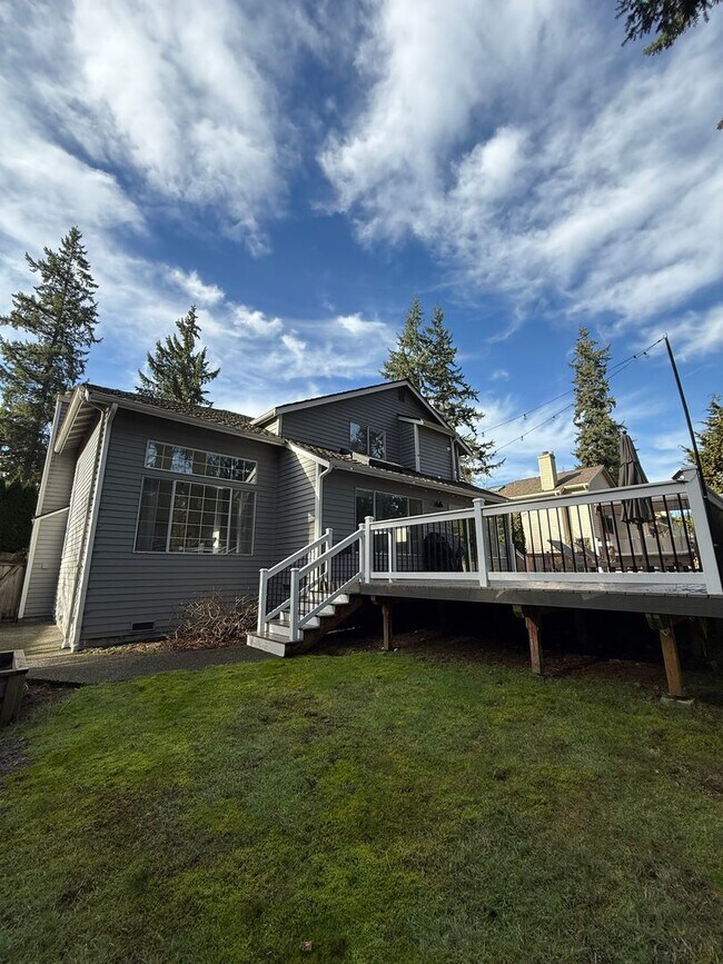 Building Photo - Beautiful 4-Bedroom Home with Expansive Deck & 3-Car Garage – Minutes to Mill Creek Town Center