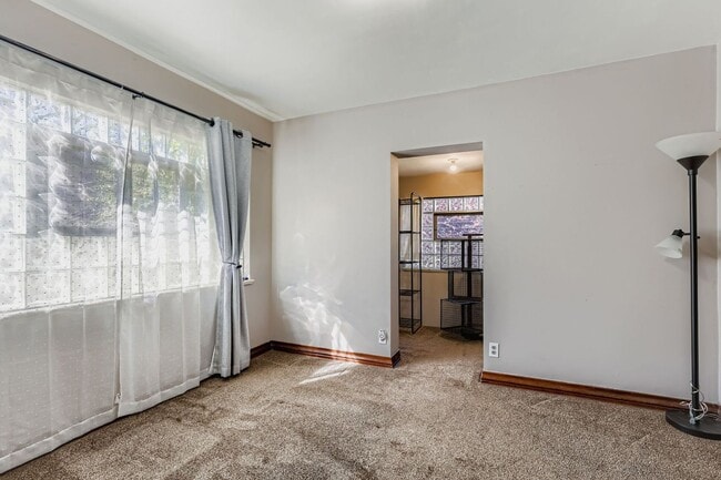 Building Photo - LOCATION LOCATION!! Unique Tudor 2-bed 1-bath upstairs unit in beautiful Tudor Duplex- All Utilit...