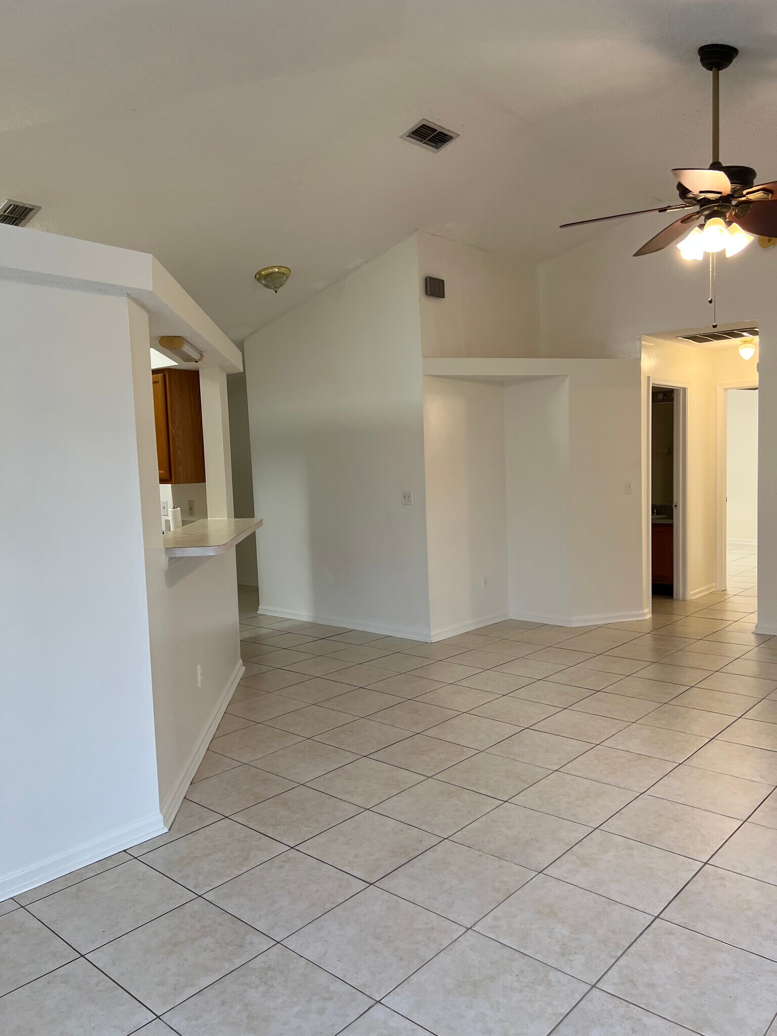 Enjoy a bright and spacious living room with an open layout and a convenient counter pass-through to - 5374 Lacy Jane Way