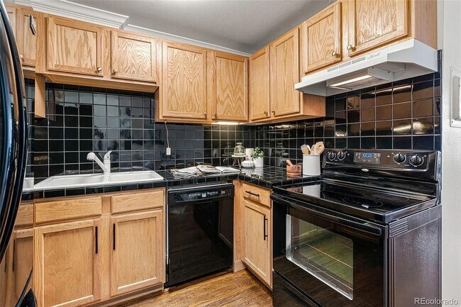 Building Photo - Sunny Corner Condo in the Heart of Capitol Hill | 2 Bed • 2 Bath • 795 Sq. Ft.