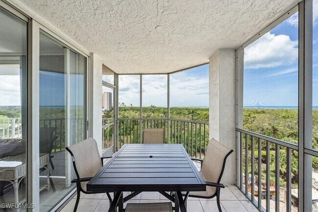Building Photo - 6361 Pelican Bay Blvd