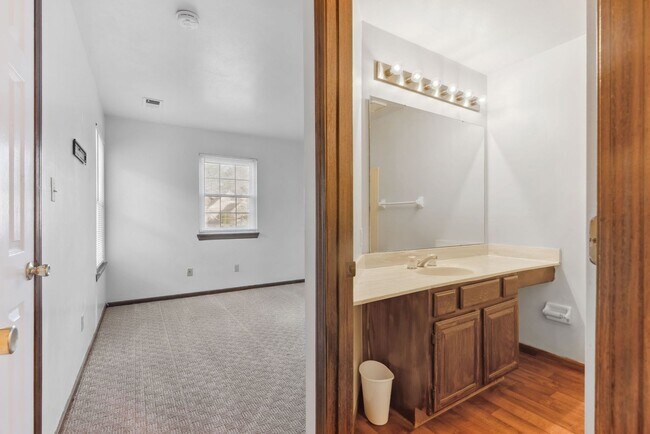Building Photo - COMING SOON - Spacious 2-Bed, 3.5-Bath Townhouse with Stunning Lake Views