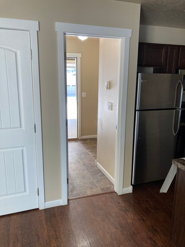 view from kitchen into laundry room and garage - 752 E Spokane Ave