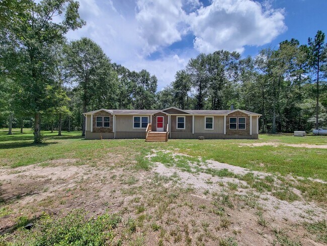 Building Photo - Cozy and Adorable home 4 bedroom 2 bath home on over 1 acre near McRae Lake! Relax on the covered...