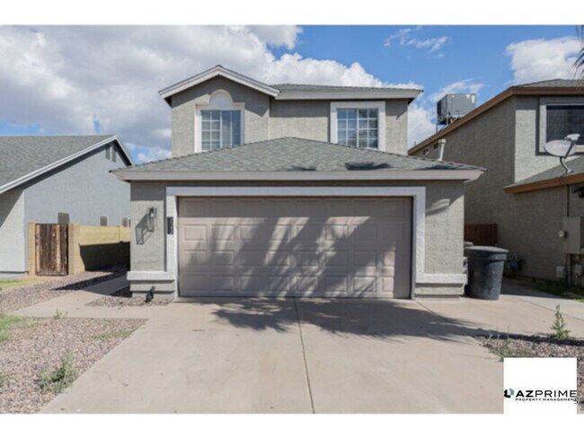 Building Photo - From The Moment You Arrive, This Gorgeous Remodeled 3/2.5 Peoria Home Captivates With Its Sun-Drench